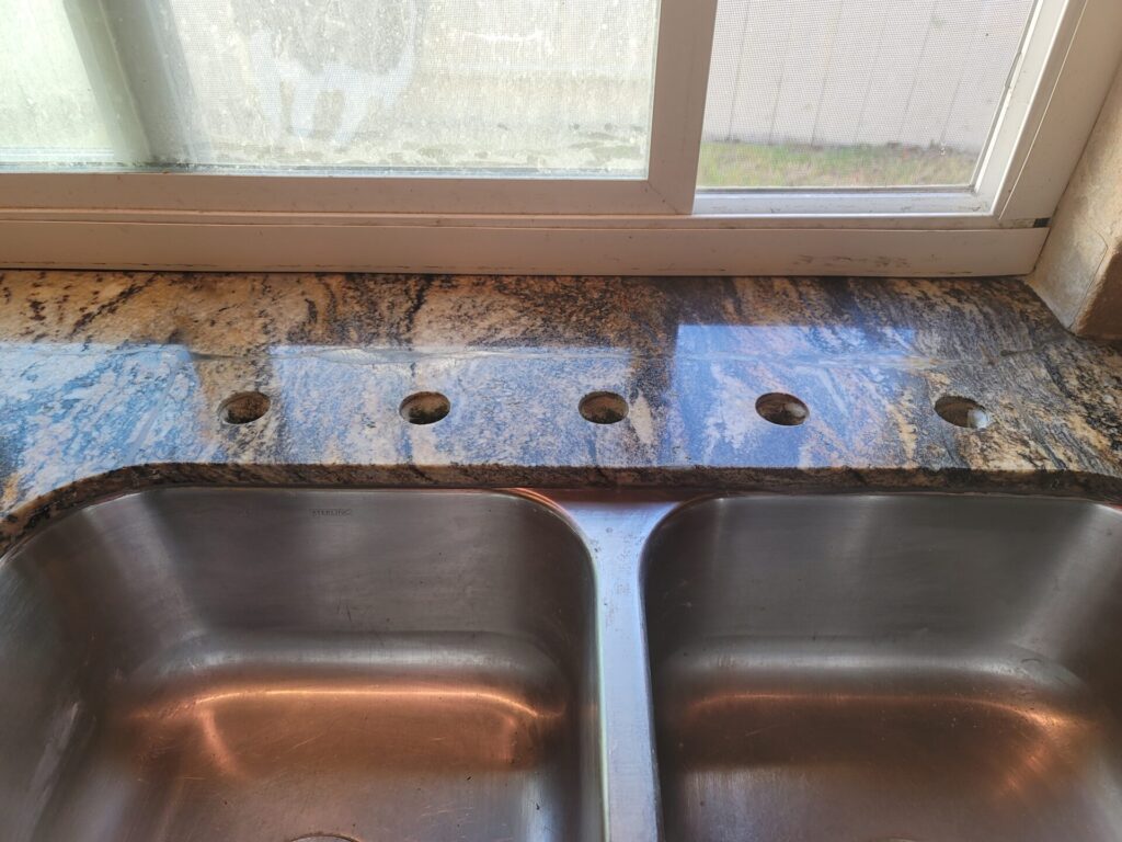 Repaired cracked granite