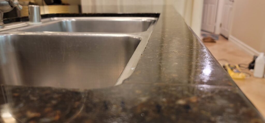 Repaired cracked granite